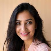 Professional headshot of Aisha Khan, Senior Consultant.